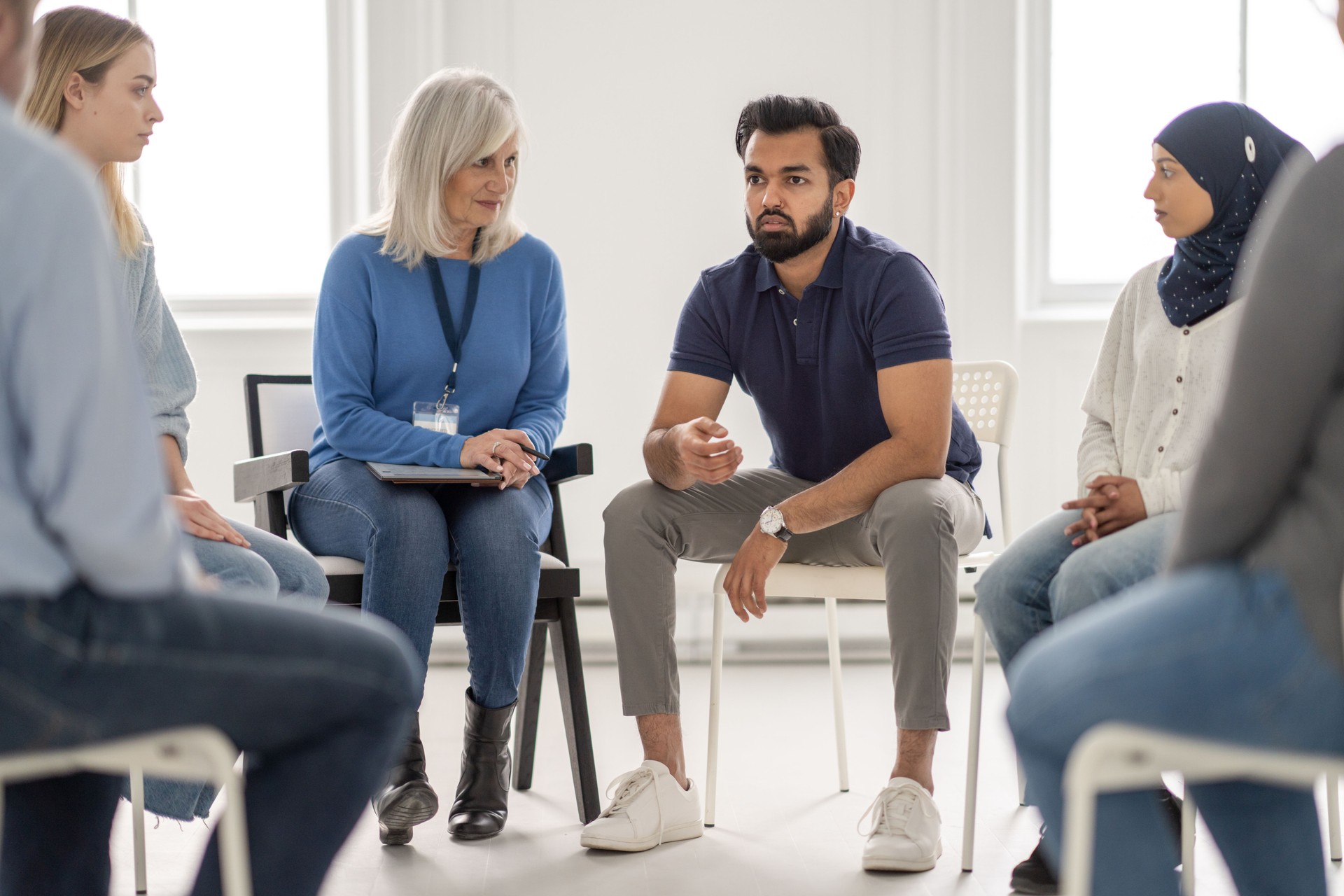 Gentleman Sharing in a Group Therapy Session